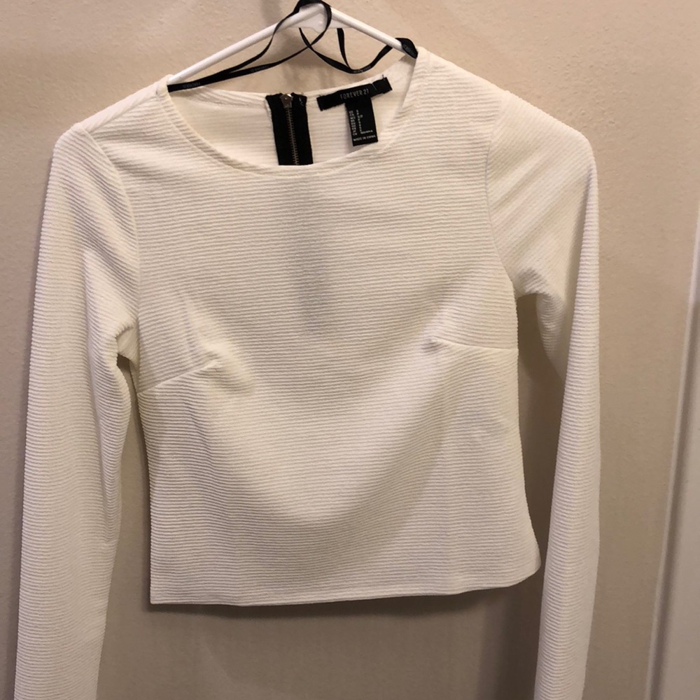 Ribbed Long Sleeve w/zipper on back.